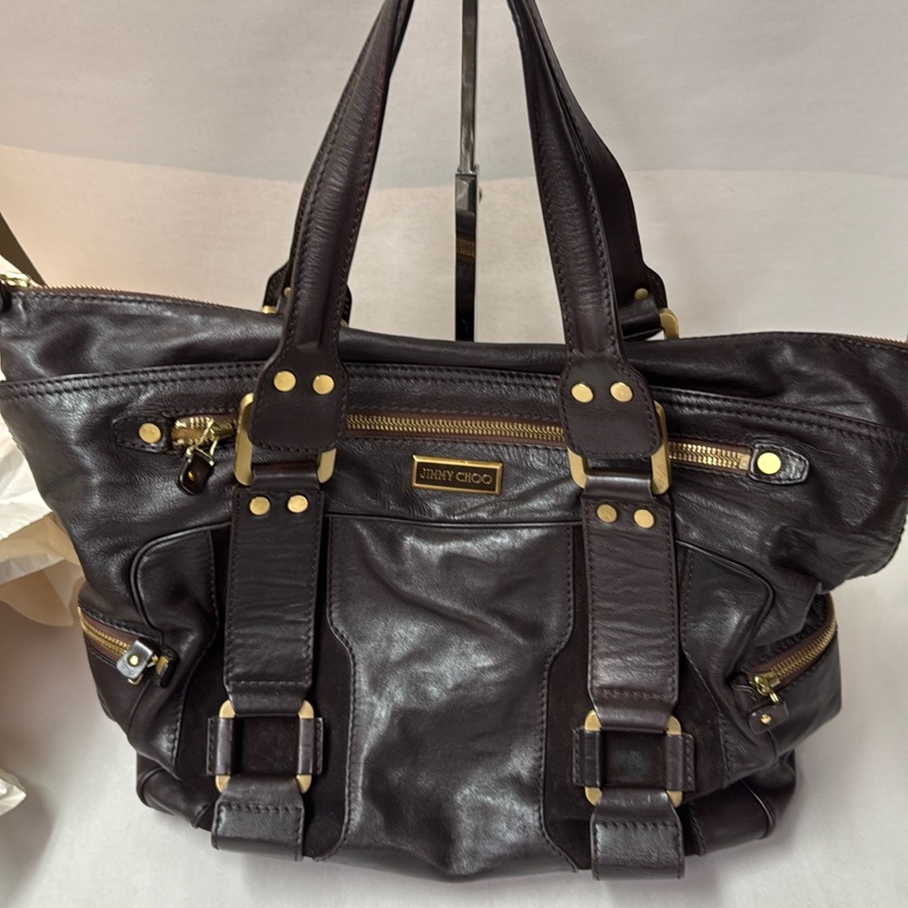 Jimmy choo tote bag 
Dark brown leather 
Great condition in /out!